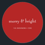 Modern Merry & Bright Red Christmas Holiday Classic Round Sticker<br><div class="desc">Modern Holiday stickers featuring the words "Merry and Bright". Ideal for the holiday season for Christmas or New Year's. Personalise the custom text above. You can also change the background colour. You can find additional coordinating items in our "Modern Colourful Merry & Bright Holiday" collection.</div>