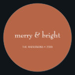 Modern Merry & Bright Terracotta Christmas Holiday Classic Round Sticker<br><div class="desc">Modern Holiday stickers featuring the words "Merry and Bright". Ideal for the holiday season for Christmas or New Year's. Personalise the custom text above. You can also change the background colour. You can find additional coordinating items in our "Modern Colourful Merry & Bright Holiday" collection.</div>