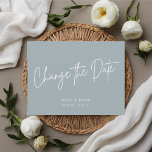 Modern Minimal Blue Change the Date Announcement Postcard<br><div class="desc">Custom-designed wedding postponement/change the date postcard featuring modern white hand lettering design on dusty blue background.</div>