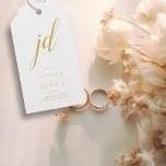 Modern Minimal Elegant Script Monogram Wedding Gift Tags<br><div class="desc">Modern Minimal Elegant Calligraphy Script Monogram Wedding Gift Tags Add a touch of elegance to your wedding favours with these stunning, modern, minimalist, and elegant calligraphy script monogram gift tags. Crafted in classic white and gold, these tags are the perfect way to personalise your gifts and thank your guests. The...</div>