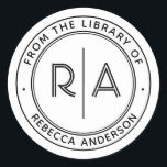 Modern Minimal Monogram The Library of Bookplate Classic Round Sticker<br><div class="desc">Enhance your personal library with our elegant and minimal "From the Library of" or "This Book Belongs To" bookplate. Featuring your monogram initials in a modern open type separated by a sleek vertical line, this custom bookplate also includes your name and personalised text in a modern sans-serif font. Perfect for...</div>