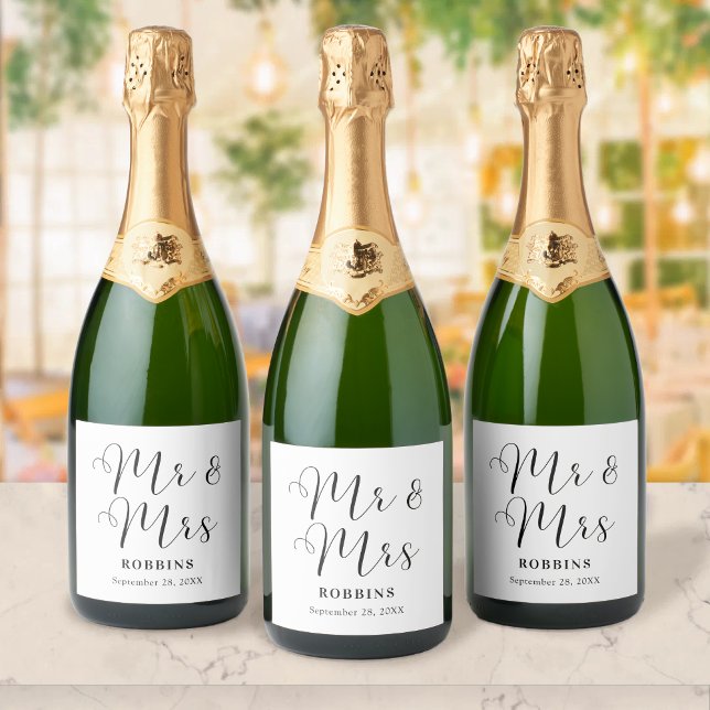 Modern Minimal Script Typography Wedding Sparkling Wine Label (Modern minimal script wine label adds chic personalization to your wedding drinks.)