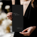 Modern Minimalist Black & White Wedding Program<br><div class="desc">Featuring a clean minimalist layout and elegant typography, this double-sided card includes all the key moments of your ceremony and a detailed wedding party list. Perfect for couples who love timeless design with a modern edge. Fully customisable to fit your wedding details. Coordinates with the full "Elena" wedding suite —...</div>