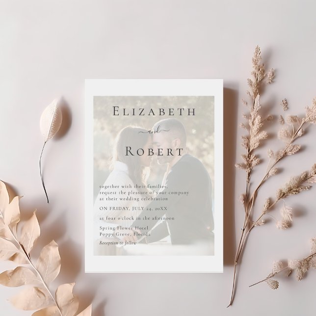 Modern Minimalist Couple Photo Wedding Invitation (Modern Minimalist Couple Photo Wedding Invitation on a table with pastel light pink dry flowers.)