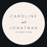 Modern Minimalist Custom Wedding Names Ivory Classic Round Sticker<br><div class="desc">Add a refined touch to your wedding favours, envelopes, or decor with these elegant minimalist personalised wedding stickers. Featuring modern typography and a clean, sophisticated design, these custom stickers are perfect for sealing invitations, favour packaging, or thank-you gifts. Personalise them with your names and wedding date for a timeless keepsake....</div>