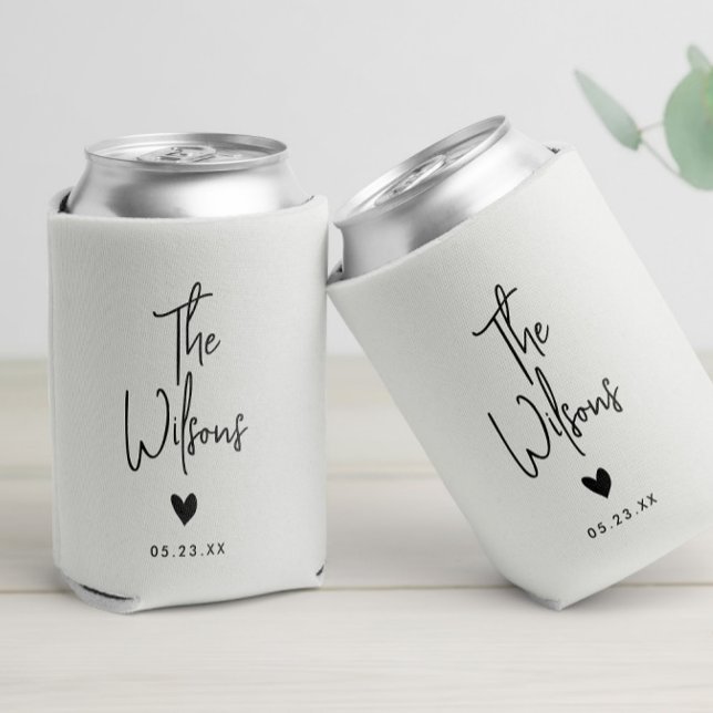 Modern Minimalist Wedding Elegant Last Name Can Cooler (A personalized wedding can cooler featuring elegant script and minimalist heart designs)