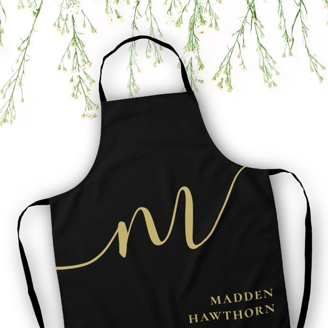 Modern Monogram Script Calligraphy Black Gold Name Apron (Creator Uploaded)