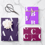 Modern monogram violet purple plum custom initial wrapping paper sheet<br><div class="desc">Modern monogram violet purple orchid plum custom initial letter gift Wrapping Paper Sheets.
plum dark violet purple orchid shades.
Customise,  personalise,  all your gifts with their individual letter,  initials.

For Birthdays,  Christmas,  Holidays gift wrapping paper</div>