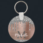 Modern Monogrammed Silver Glitter Drips Pink Metal Key Ring<br><div class="desc">Modern, girly silver grey glitter drips name and monogrammed keychain.This design features silver grey (grey) glitter sparkle drips on pink rose gold brushed metal background with custom personalised monogram initial and first name text template. Perfect feminine gift. Please note, this design is printed photo effect. If you need help or...</div>