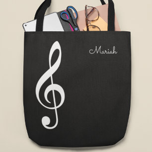 modern music treble clef on black tote bag