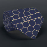 Modern Navy Blue Gold Foil Geometric Monogram Tie<br><div class="desc">Modern Navy Blue Gold Foil Geometric Monogram Necktie in a stylish pattern of stylish gold hexagons on an elegant navy blue background. Easy to customise with text, fonts, and colours. Created by Zazzle pro designer BK Thompson © exclusively for Cedar and String; please contact us at cedarandstring@gmail.com if you need...</div>