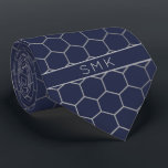 Modern Navy Blue Silver Foil Geometric Monogram Tie<br><div class="desc">Modern Navy Silver Foil Geometric Monogram Necktie in a stylish pattern of silvery grey hexagons on an elegant navy blue background. Easy to customise with text, fonts, and colours. Created by Zazzle pro designer BK Thompson © exclusively for Cedar and String; please contact us at cedarandstring@gmail.com if you need assistance,...</div>