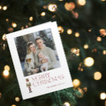 Modern Nutcracker Merry Christmas Family Photo Card<br><div class="desc">Celebrate the holiday season with the Modern Nutcracker Merry Christmas Photo Typography Card! This stunning card features a beautiful watercolor nutcracker set against a backdrop of festive typography in a rich burgundy hue. Personalise your family photo and family name to make your card truly unique. Upon opening the card, traditional...</div>