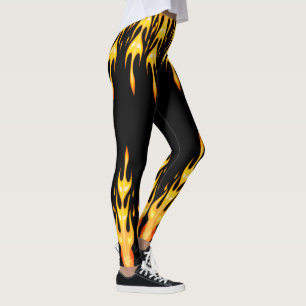Modern orange yellow fire flames on black leggings