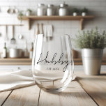 Modern Personalised Hubby  Stemless Wine Glass<br><div class="desc">This wine glass isn't just any glass; it's his trusted companion for indulging in the finer things in life. Crafted with sleek modern design and personalised with his name, this glass embodies his sophisticated taste and appreciation for the finer details. Whether it's a rich red or crisp white, this glass...</div>