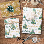 Modern Personalised Merry Christmas Tree Script Wrapping Paper Sheet<br><div class="desc">Create your own personalised coordinated set of novelty Christmas giftwrap with your choice of greeting (the sample shows MERRY CHRISTMAS) and your name or other custom text in a modern, trendy handwritten script font, a watercolor Christmas tree and snowflakes pattern in a green, gold and white colour scheme. ASSISTANCE: For...</div>