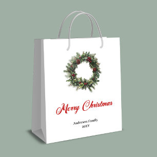 Modern pine wreath gift bag in traditional colors
