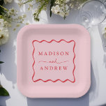 Modern Pink and Red Wavy Frame Wedding Paper Plate<br><div class="desc">Add a stylish touch to your wedding reception, rehearsal dinner, engagement party, or wedding shower with these Modern Pink and Red Wavy Frame paper plates. The retro wedding paper plates display the couple's names in bold red lettering surrounded by a red wavy border contrasting with a pink background. The trendy...</div>