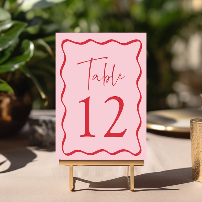 Modern Pink and Red Wavy Frame Wedding Table Number (Creator Uploaded)