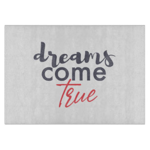 Modern playful graphic design of Dreams Come True Cutting Board