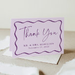 Modern Purple Wavy Frame Photo Wedding Thank You<br><div class="desc">Thank your friends and family in style with this Modern Purple Wavy Frame photo wedding thank you card! The design displays "Thank You" in a handwritten purple script surrounded by a purple wavy border contrasting with a light purple background. Personalise the front of the card with your name and wedding...</div>