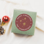 Modern Red & Gold Sparkles Merry Christmas Classic Round Sticker<br><div class="desc">A fun and festive design, featuring faux gold hand-drawn sparkles, and retro typography. A greeting of your choice is curved around the top of the sticker, and your family name is curved around the bottom. The text creates a round frame around the sparkles. Ideal for sealing envelopes, decorating gift boxes,...</div>