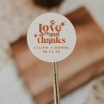 Modern Retro Cream and Orange Wedding Thank You  Classic Round Sticker<br><div class="desc">This Modern Retro Cream and Orange Wedding Thank You Classic Round Sticker is a great way to add a little more personalisation to your big day. The colour palette of orange and cream gives this an extra modern,  yet vintage retro look. Say thank you with Love & Thanks.</div>