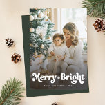 Modern Retro Simple Photo Christmas Holiday Card<br><div class="desc">This Modern Retro Simple Photo Christmas Holiday Card offers a clean and sophisticated design with a full family photo and large "Merry   Bright" retro script typography. The casual,  yet retro style blends effortlessly with the natural setting,  making it a perfect option for families seeking a timeless holiday greeting.</div>