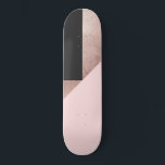 Modern Rose Gold Black Blush Pink Geometric Skateboard<br><div class="desc">This elegant and chic pattern is perfect for the modern woman. It features a faux printed rose gold foil, black, and blush pink color block triangle geometric pattern. It's stylish, trendy, unique, and fashionable! ***IMPORTANT DESIGN NOTE: For custom requests relating to changes of design aspects; including color swaps or matching...</div>