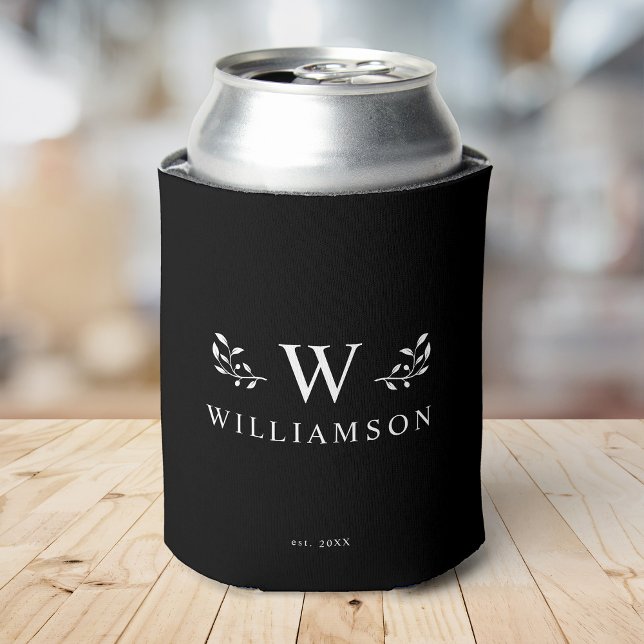 Modern Rustic Monogram Custom Family Name Black Can Cooler (silver can sits in a black can cooler with "WILLIAMSON" and a "W" monogram in elegant white text. )