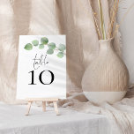 Modern Sage Eucalyptus Script Wedding Table Number<br><div class="desc">Modern Sage Eucalyptus Script Wedding. Table is set in a handwriting style script and your table number beneath with elegant watercolor foliage across the top from the right. Easily personalise the number. The same design is on the other side and will update simultaneously as you make your change to the...</div>