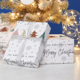 Modern script cute pattern trees and snowflakes wrapping paper