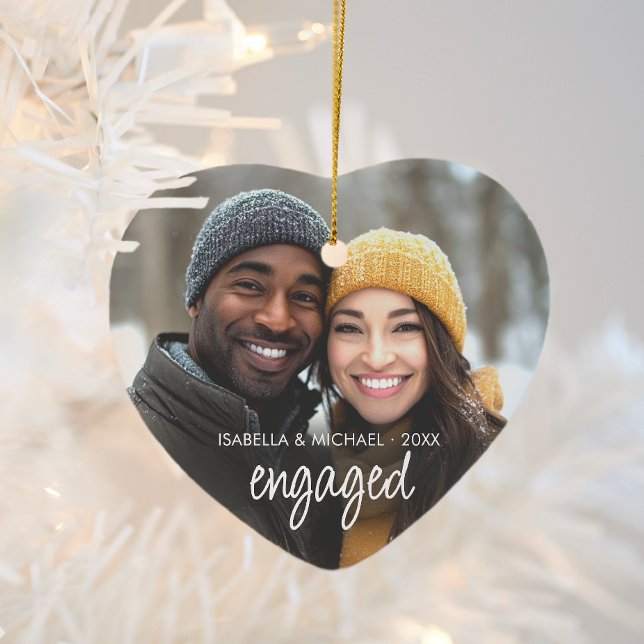 Modern Script Engaged Couple Photo Holiday Heart Ceramic Ornament (Modern engaged couple photo ornament with script text and personalizable names and year. )