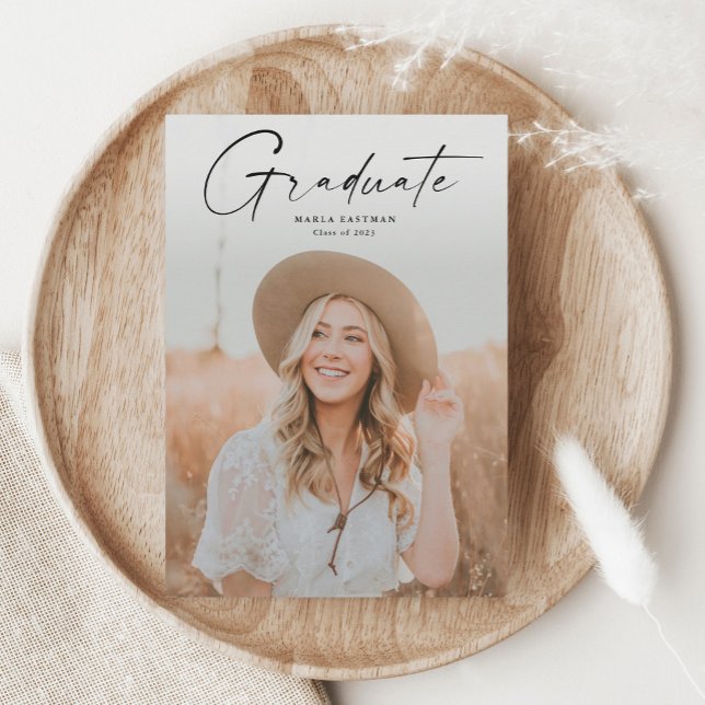 Modern Script Graduate Photo Graduation Announcement (Modern handwritten script photo graduation announcement card.)