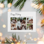 Modern Script Happy Holidays Five-Photo Holiday Card<br><div class="desc">This modern script happy holidays five-photo holiday card is perfect for your minimalist shabby chic boho black and white holiday greeting. The minimal whimsical handwritten calligraphy is delicate and rustic while staying classy and elegant. The design reflects a simple all-white winter day and evokes memories of a more simplistic life....</div>