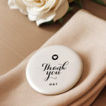 Modern Script Heart Monogram Thank You Pin Button<br><div class="desc">Add a modern twist to your “Thank You” gifts with this modern heart thank you pin button. Featuring a clean design with the couple's initials and a heart graphic, this button is the ideal gift for your wedding guests, bridesmaids, and groomsmen at weddings, bridal showers, anniversaries, or any other special...</div>