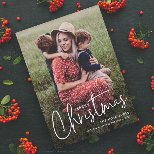 Modern Script Merry Christmas Simple Photo Holiday Card (Modern Script Merry Christmas Photo Holiday Card with Handwritten Typographic Overlay.)