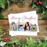 Modern Script Merry Christmas Three Photo Holiday Postcard<br><div class="desc">This lovely holiday photo postcard features three photos and the greeting "Merry Christmas". The design is simple yet elegant. This design accommodates two vertical and one horizontal photos. On the backside you will find plenty of space to write your own personal greeting and the address of the recipient. Postcards are...</div>