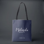 Modern Script Navy Blue Personalised Bridesmaids Tote Bag<br><div class="desc">Modern Script Navy Blue Personalised Bridesmaids Tote Bag
featuring personalised bridesmaid's name in modern calligraphy font style with title and wedding date in modern sans serif font style on navy blue background.
Also perfect for Maid of Honour, Flower Girl, Mother of the Bride and more.</div>