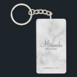 Modern Script Personalised Bridesmaid Key Ring<br><div class="desc">Add a personal touch to your wedding with personalised bridesmaid keychain. This keychain features personalised bridesmaid's name in grey modern script font style with title and wedding date in grey modern sans serif font style on white marble background. Also perfect for maid of honour, mother of the bride and more....</div>
