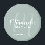 Modern Script Personalised Bridesmaid Magnet<br><div class="desc">Add a personal touch to your wedding with personalised bridesmaid magnet. This magnet features personalised bridesmaid's name in white modern script font style and monogram in sage green modern script font style as background with title and wedding date in white modern sans serif font style on sage green background. Also...</div>