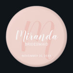 Modern Script Personalised Bridesmaid Magnet<br><div class="desc">Add a personal touch to your wedding with personalised bridesmaid magnet. This magnet features personalised bridesmaid's name in white modern script font style and monogram in blush pink modern script font style as background with title and wedding date in white modern sans serif font style on blush pink background. Also...</div>