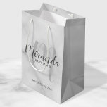 Modern Script Personalised Bridesmaid White Marble Medium Gift Bag<br><div class="desc">Personalised Bridesmaids Gift Bag featuring personalised bridesmaid's name in grey modern script font style and monogram in light grey modern script font style as background with title and wedding date in grey modern sans serif font style on white marble background. Also perfect for groomsman, best man, ring bearer, father of...</div>