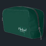 Modern Script Personalised Groomsman Monogram Name Dopp Kit<br><div class="desc">Add a personal touch to your wedding with personalised groomsman gift. This design features personalised groomsman's name in white modern script font style and monogram in light emerald green modern script font style as background with title in white modern sans serif font style on emerald green background. Also perfect for...</div>