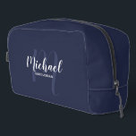 Modern Script Personalised Groomsman Monogram Name Dopp Kit<br><div class="desc">Add a personal touch to your wedding with personalised groomsman gift. This design features personalised groomsman's name in white modern script font style and monogram in light navy blue modern script font style as background with title in white modern sans serif font style on navy blue background. Also perfect for...</div>
