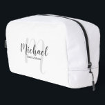 Modern Script Personalised Groomsman Monogram Name Dopp Kit<br><div class="desc">Add a personal touch to your wedding with personalised groomsman gift. This design features personalised groomsman's name in grey modern script font style and monogram in light grey modern script font style as background with title in grey modern sans serif font style on white background. Also perfect for maid of...</div>