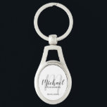 Modern Script Personalised Groomsmen Key Ring<br><div class="desc">Add a personal touch to your wedding with personalised groomsmen keychain. This keychain features personalised groomsmen's name in grey modern script font style and monogram in light grey modern script font style as background with title and wedding date in grey modern sans serif font style on white background. Also perfect...</div>