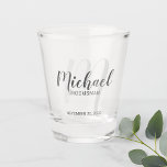 Modern Script Personalised Groomsmen Shot Glass<br><div class="desc">Add a personal touch to your wedding with personalised groomsmen shot glass. This shot glass features personalised groomsmen's name in grey modern script font style and monogram in light grey modern script font style as background with title and wedding date in grey modern sans serif font style. Also perfect for...</div>