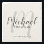 Modern Script Personalised Groomsmen Stone Coaster<br><div class="desc">Add a personal touch to your wedding with personalised groomsmen stone coaster. This coaster features personalised groomsmen's name in grey modern script font style and monogram in light grey modern script font style as background with title and wedding date in grey modern sans serif font style. Also perfect for best...</div>