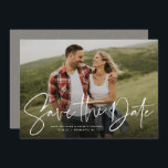 Modern script trendy save the date photo card<br><div class="desc">With a single horizontal photo and a modern script written "save the date, " this card is the perfect way to announce your engagement and upcoming wedding to friends and family. The white text is bold and modern but still sophisticated. The customisable text on the front has room for names,...</div>
